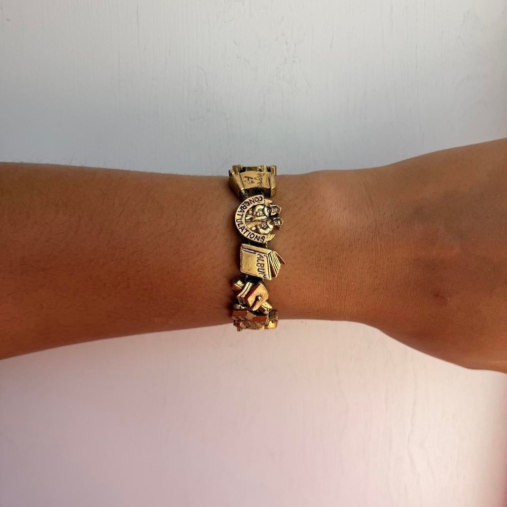 GOLD TONE COLLEGE GRADUATION THEMED SLIDING CHARM BRACELET